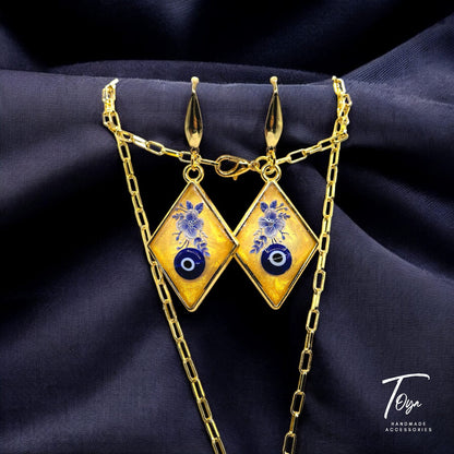 Golden Resin With Blue Evil Eye Pendant and Earring Set with Golden Plated Chain Jewelry Set for Women